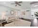 Bright living room featuring comfortable seating, stylish décor, and hardwood floors creates a welcoming and elegant space at 1536 Keshi Pearl Dr, Mount Pleasant, SC 29466