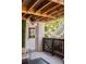 Cozy outdoor patio with covered ceiling and access to the backyard, stairs, and outdoor entry at 1536 Keshi Pearl Dr, Mount Pleasant, SC 29466