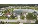 Beautiful home in a lakeside community with well-maintained lawns and mature trees at 170 Highwoods Plantation Ave, Summerville, SC 29485