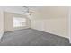 Carpeted bonus room featuring a ceiling fan and a bright window at 170 Highwoods Plantation Ave, Summerville, SC 29485