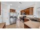 Functional kitchen with stainless steel appliances, tile backsplash, and adjacent pantry at 170 Highwoods Plantation Ave, Summerville, SC 29485