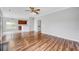 Spacious living room featuring hardwood floors and an open floor plan leading to the kitchen at 170 Highwoods Plantation Ave, Summerville, SC 29485
