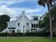 Charming two-story home with landscaped yard, and covered porch at 1727 Atlantic Ave, Sullivans Island, SC 29482