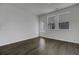 Bright room with hardwood floors, natural light, and a door to the outside at 1816 Nola Run, Summerville, SC 29485