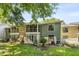 Backyard view featuring green siding, lush greenery, and a tranquil outdoor space at 1872 Montclair Dr # C, Mount Pleasant, SC 29464