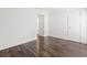 Bedroom with wood floors, white walls, and an open doorway at 1872 Montclair Dr # C, Mount Pleasant, SC 29464
