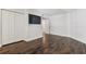 Spacious bedroom with hardwood floors, a built-in entertainment center, and a closet at 1872 Montclair Dr # C, Mount Pleasant, SC 29464