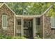 Brick exterior with inviting front entrance and stairs leading to the second level condos at 1872 Montclair Dr # C, Mount Pleasant, SC 29464