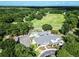 Aerial view of golf course clubhouse with outdoor dining area at 19 Rudwick Cir, Goose Creek, SC 29445