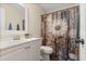 Bathroom featuring a decorative shower curtain, vanity, and neutral finishes at 19 Rudwick Cir, Goose Creek, SC 29445