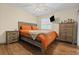 Bedroom with wood-look flooring and a ceiling fan, filled with natural light at 19 Rudwick Cir, Goose Creek, SC 29445