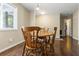 Cozy dining room featuring a wooden table, chairs, and natural light at 19 Rudwick Cir, Goose Creek, SC 29445