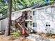 Charming condo with a gray exterior, wood stairs and inviting decor at 19 Rudwick Cir, Goose Creek, SC 29445