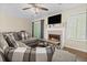 The living room features a fireplace, plush sectional couch, and sliding doors to the outside at 19 Rudwick Cir, Goose Creek, SC 29445