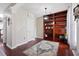 Inviting entryway with hardwood floors, elegant decor, and a decorative wooden bookshelf at 200 Topsaw Ln, Moncks Corner, SC 29461