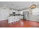 Modern kitchen featuring white cabinets, granite countertops, stainless steel appliances, and a breakfast bar at 200 Topsaw Ln, Moncks Corner, SC 29461