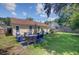 Well-manicured backyard with a patio, furniture, and lush lawn at 2076 Presidio Dr, Mount Pleasant, SC 29466