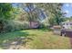 A large backyard with both a hammock and barbecue grill, great for entertaining at 2076 Presidio Dr, Mount Pleasant, SC 29466