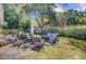 A charming backyard with a patio, fire pit, and comfortable seating at 2076 Presidio Dr, Mount Pleasant, SC 29466