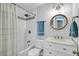Bathroom featuring a shower-tub combo, a marble vanity, and attractive lighting at 2076 Presidio Dr, Mount Pleasant, SC 29466