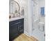 Bathroom featuring modern vanity with granite countertop and a tiled shower at 2076 Presidio Dr, Mount Pleasant, SC 29466