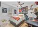 Bedroom with unique decorations, featuring a mounted wall of sports-themed decorations at 2076 Presidio Dr, Mount Pleasant, SC 29466