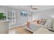 Bedroom featuring stylish decor, natural light from a large window, and a ceiling fan at 2076 Presidio Dr, Mount Pleasant, SC 29466