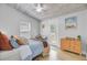Cozy bedroom featuring a decorative ceiling, and ample natural light from a large window at 2076 Presidio Dr, Mount Pleasant, SC 29466