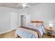 Serene bedroom boasts stylish decor, including an elegant light fixture and a calming color scheme at 2076 Presidio Dr, Mount Pleasant, SC 29466