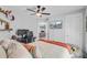 Bedroom with unique decorations, featuring a large comfortable chair and wall-mounted shelving at 2076 Presidio Dr, Mount Pleasant, SC 29466