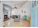 Bright, open living room features a fireplace, modern furnishings, and wood-look flooring at 2076 Presidio Dr, Mount Pleasant, SC 29466