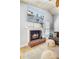 Inviting living room featuring a brick fireplace, mounted television, and stylish decor at 2076 Presidio Dr, Mount Pleasant, SC 29466