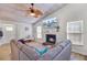 Comfortable living room with a fireplace, ample seating, and plenty of natural light offers a cozy ambiance at 2076 Presidio Dr, Mount Pleasant, SC 29466