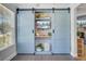 Unique pantry design with sliding doors, interior shelving, and space for appliances at 2076 Presidio Dr, Mount Pleasant, SC 29466