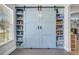 Spacious pantry with shelving and sliding doors, providing organized storage solutions at 2076 Presidio Dr, Mount Pleasant, SC 29466
