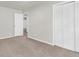 This spacious bedroom features plush carpeting, a closet, and neutral walls at 220 Runnymede Ln, Summerville, SC 29485