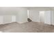 Spacious bonus room with carpet and access to a staircase and multiple rooms at 220 Runnymede Ln, Summerville, SC 29485
