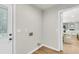 Mud room with wood-look floors and view to the backyard at 220 Runnymede Ln, Summerville, SC 29485