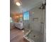 Bright bathroom with a glass-enclosed shower and dual sink vanity with great lighting at 308 Tidal Rice Ct, Wando, SC 29492