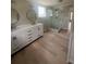 Bathroom features double sinks, granite counters, wood floors, and a glass enclosed shower at 308 Tidal Rice Ct, Wando, SC 29492