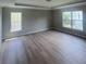 Large bedroom with ample natural light and beautiful wood floors at 308 Tidal Rice Ct, Wando, SC 29492