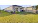 A serene backyard with a charming patio, ideal for enjoying outdoor leisure and gatherings at 325 Coral Sunset Way, Summerville, SC 29486