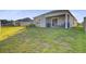 Well-maintained backyard with a covered patio area, perfect for outdoor entertaining and relaxation at 325 Coral Sunset Way, Summerville, SC 29486