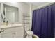Bright bathroom with vanity, mirror, and shower/tub combination with curtain at 325 Coral Sunset Way, Summerville, SC 29486