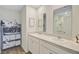 Bright bathroom features double sinks, white cabinetry, and ample storage space, perfect for a functional and stylish design at 325 Coral Sunset Way, Summerville, SC 29486