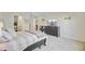 Spacious bedroom with carpet, TV, closet and ensuite bathroom at 325 Coral Sunset Way, Summerville, SC 29486