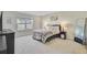 Comfortable bedroom with a large window, soft carpet, and neutral decor, creating a peaceful retreat at 325 Coral Sunset Way, Summerville, SC 29486