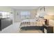 Serene bedroom features plush carpet, a large window, and neutral decor creating a cozy and inviting ambiance at 325 Coral Sunset Way, Summerville, SC 29486