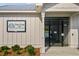 The Club at Shell Pointe entry gate showcases a modern design with secure access to amenities at 325 Coral Sunset Way, Summerville, SC 29486
