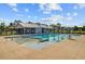 Inviting community pool with an accessible ramp, a zero-entry area, and lounge chairs for relaxation at 325 Coral Sunset Way, Summerville, SC 29486
